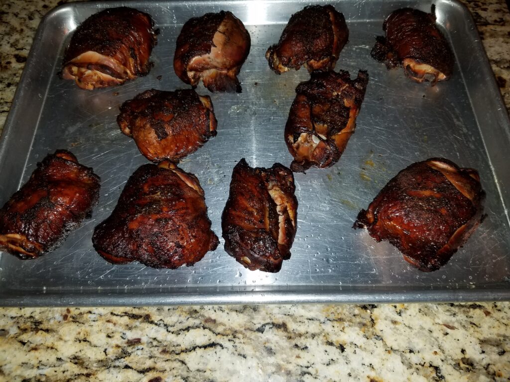 Chicken thighs finished smoking and crisped up on propane grill