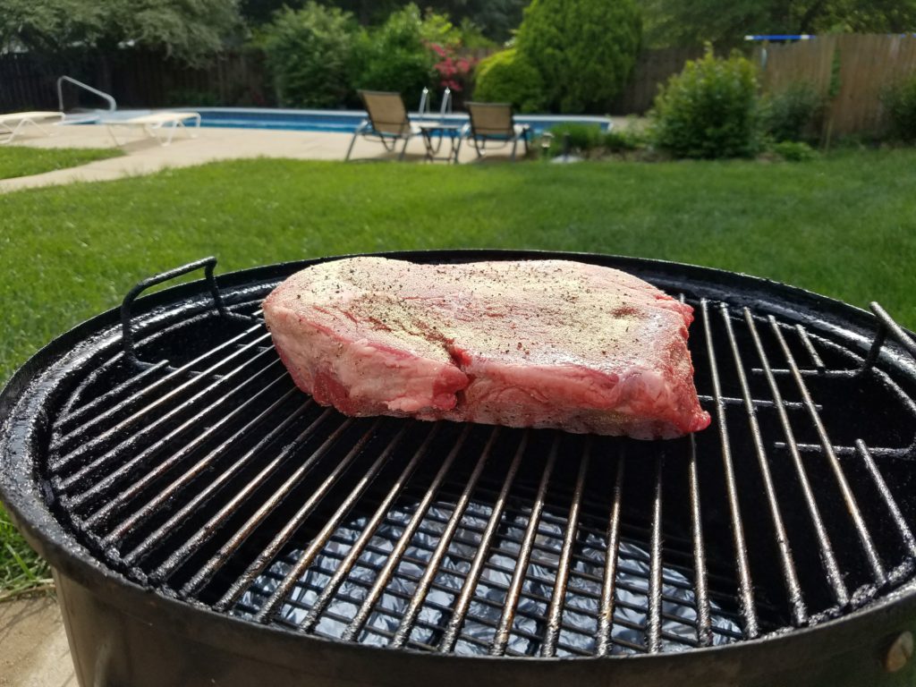 Raw seasoned chuck roast before smoking
