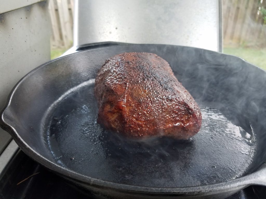 Eye round searing in a cast iron pan