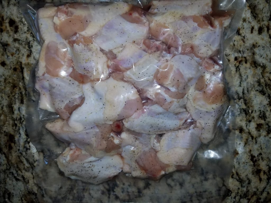 First batch of wings, salt-and-pepper seasoned, sealed and going into the sous vide bath