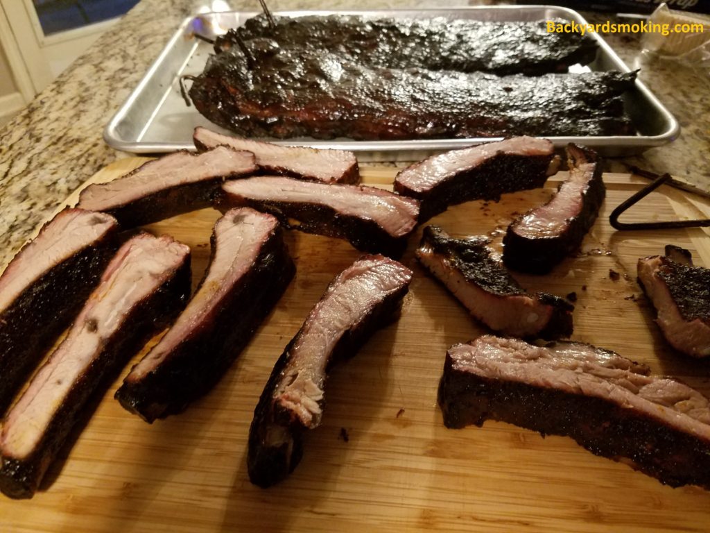 sliced St LOuis Style Ribs that were smoked hung