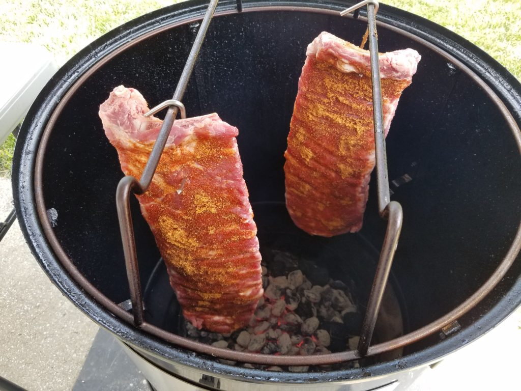 St. Louis style ribs hanging directly over the coals during the second attempt