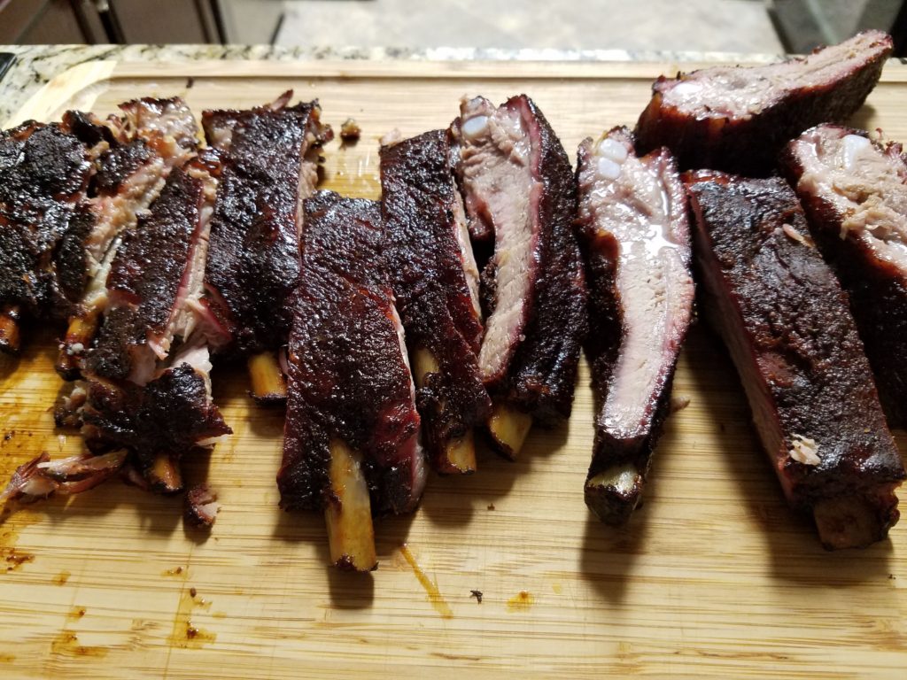 Sliced hanging ribs from a later attempt, showing tender texture and bark