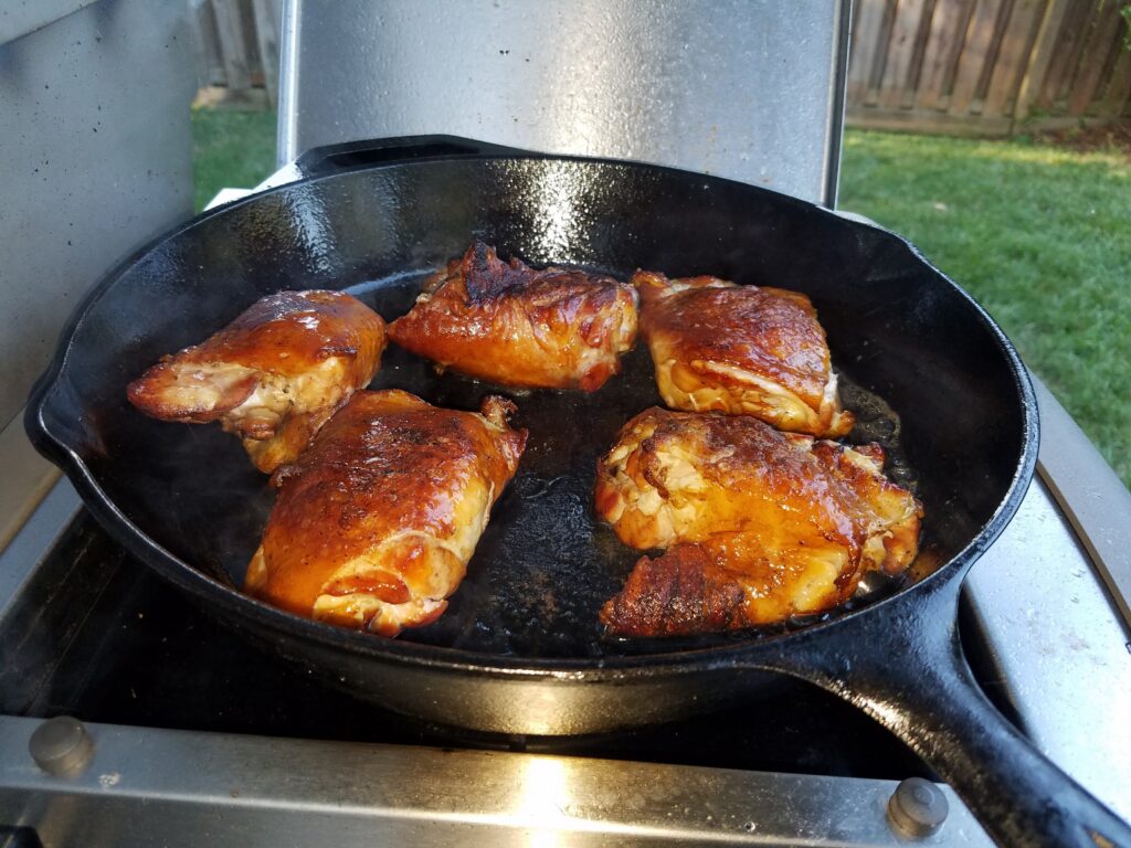 The remaining chicken thighs finished in a hot cast iron skillet